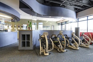 Exercise area at a physical therapy clinic in Glendale, AZ, with cardio-style machines.